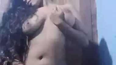 Horny Bangla girl strips and fingers her pussy in nude MMS