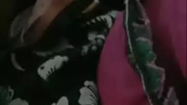 Aunty with perfect pussy lies in bed with legs wide open in XXX video