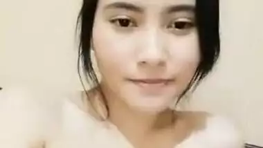 Tits of the Indian kitty in a red dress will make spectators horny