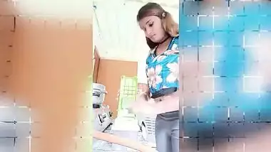 Chubby Desi gal while cooking can barely hide her perky XXX boobs