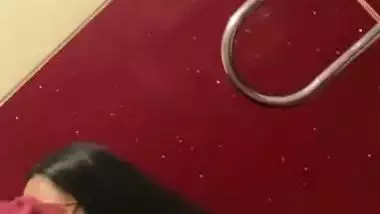 Chubby girl gives an outdoor blowjob in a cinema theatre