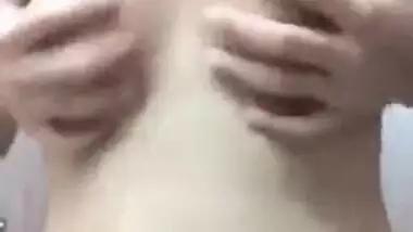 Desi teen gets naked and exposes small boobies in XXX porn video