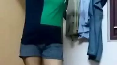 Indian MILF flashes her breasts on camera during changing in home porn