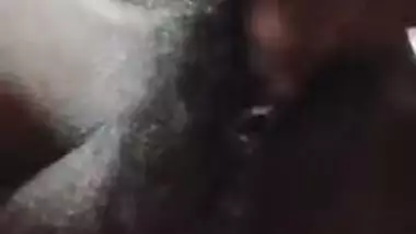 Shameless Desi wench shows off and spreads her hairy XXX twat on cam
