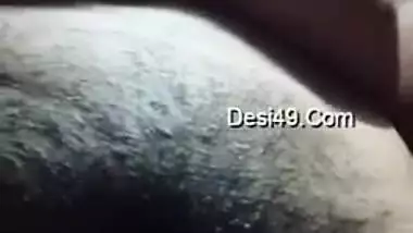 Desi girl takes saggy boobs out and films her swollen hairy clitoris
