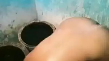 Indian woman prepares for sex by washing XXX curves in the bathroom