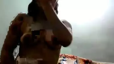 Masked Indian chick in green panties acts on webcam instead of porn