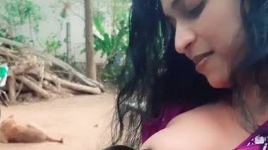 Indian Girl Is Breast Feeding To Dog